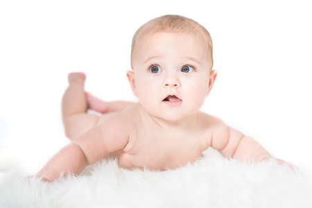 Baby bright photoshoot on a white blanket and white background