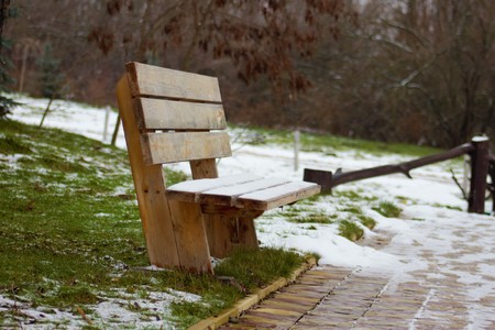 Wooden bench, Snow on a wooden bench, Wooden bench, Lavochka green grassの写真素材