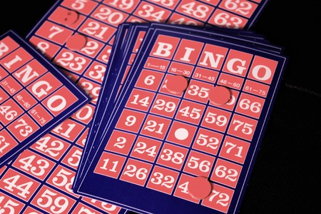 Playing  Bingo card on a black backgroundの写真素材