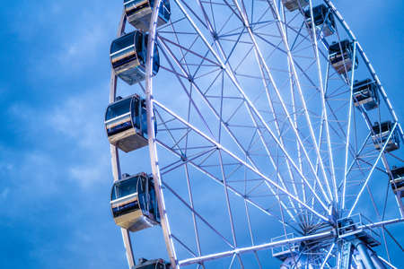 Ferris Wheel against a blue skyの写真素材
