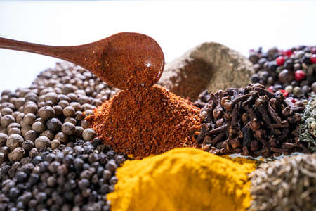 Different spices set on white background.