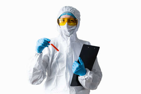 Woman working with blood sample in laboratory.