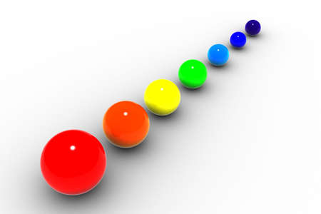 The image of spheres from the colors of a rainbow located by way of reduction of radiusの写真素材