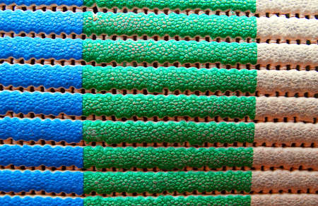 Abstract square background from a piece of linoleum.の写真素材