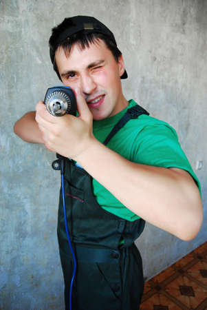 Young man in a builder uniform.の写真素材