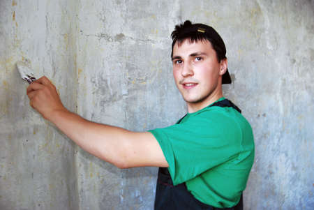 Young man in a builder uniform.の写真素材