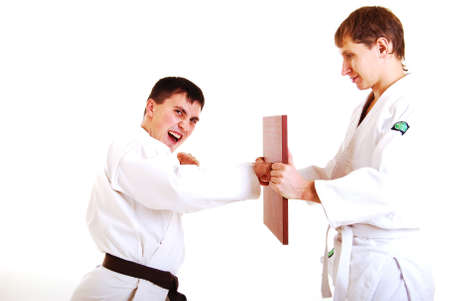 Two karatekas on a white background.の写真素材