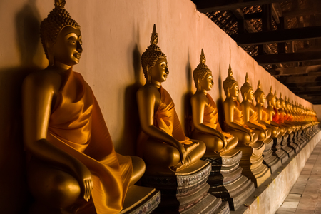 ancient ancient Buddha statues in the ancient Thai capital of Ayutthaya in the temple ruinsのeditorial素材