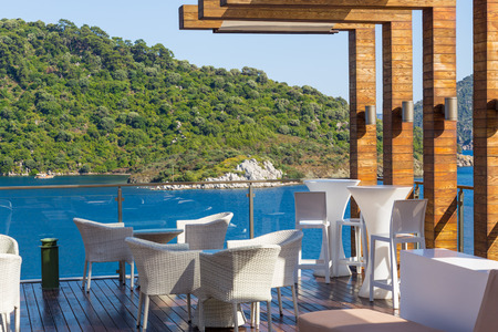 beautiful interior terrace overlooking the blue sea and the mountain with pinesのeditorial素材