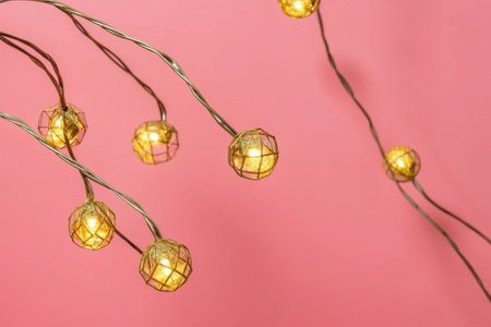 a bunch of lights hanging from a stringの素材