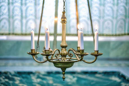 Burning candles in a candlestick in the church. Selective focus.の素材