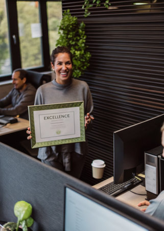 a woman holding a sign in an officeの素材