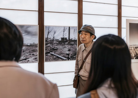 Three individuals stand within a dimly lit art gallery, surrounded by evocative black-and-white photographs. The central figureの素材