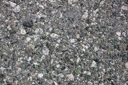 Background of a mountain stone covered with moss.