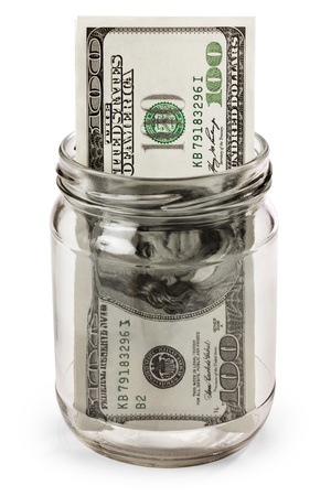 American dollars in a jar isolated on white backgroundの写真素材