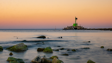 Mouth of the river Vistula. Breakwater on the sea shore and protection walls. Gdansk Gorki Zachodnie, Polandの写真素材