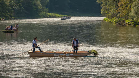 Szczawnica, Poland - September 11, 2020. Typical polish raftsmans on the Dunajec river. The rafting is very popular tourist attraction in Pieniny mountains.のeditorial素材