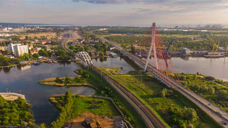 Cable-stayed bridge and railway bridge in GdaÅsk, Vistula, port areas and PrzerÃ³bka.の写真素材