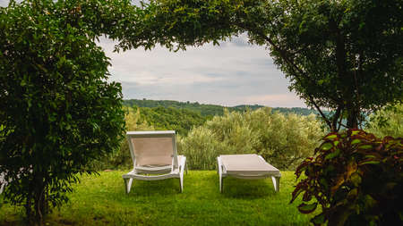 A sunbed toward panoramic view of Impruneta.の写真素材