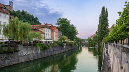 View of the Triple Bridge, Ljubljana, Slovenia shortly after sunrise.の写真素材
