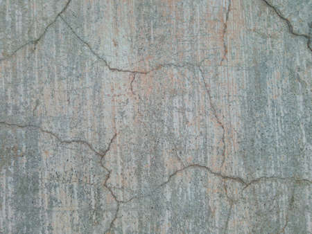 texture of gray concrete wall cracked from old age