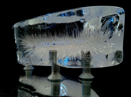 abstract photo of ice with patterns inside it on black background