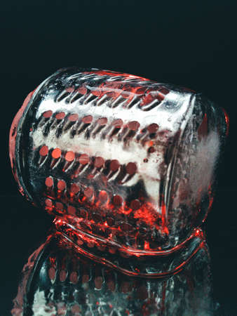 abstract and creative photo of a metal shredder in ice