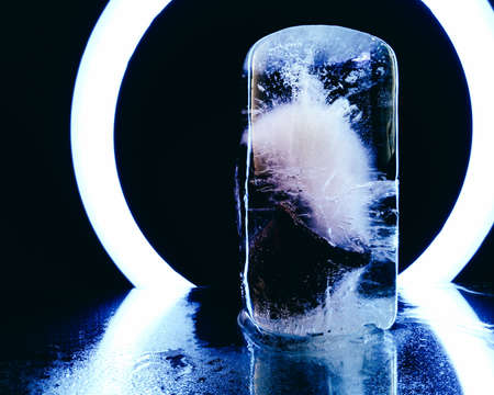backlit ice in the dark in abstract macro photographyの写真素材