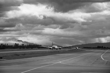 plans on track waiting for permission to take off.のeditorial素材
