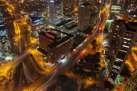 most important buildings of the financial industry in the center of Bogota at night where one of the main roads is being repaired. Bogota Colombia . October 22, 2010のeditorial素材