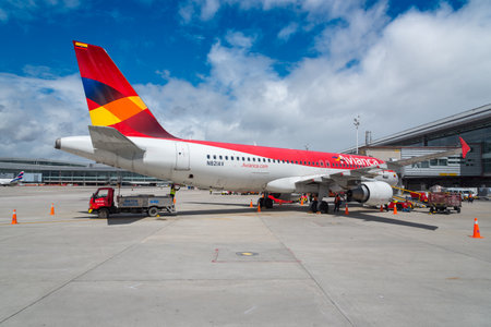 Avianca airline line parked receiving water supply at El Dorado airport. Bogot?.Colombia. 3 June...