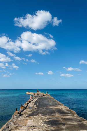 Old pier over blue sea. Havana. Cuba.の写真素材