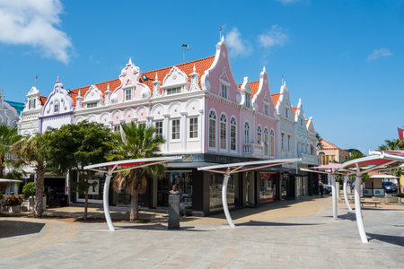 Facades of luxury items stores with Dutch architecture in the center of the city, a place of interest for tourists who visit the island. Oranjestad. Aruba February 2, 2019.のeditorial素材