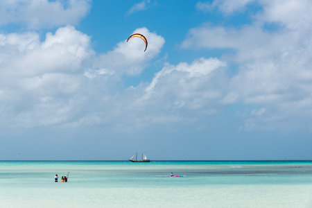 Kiteboarding is common this sport on the beaches of Aruba. Where you see many learning like others who have total control of the discipline. Hadicurari beach. Aruba February 24, 2019.のeditorial素材