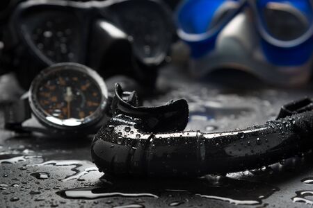 Diving equipment with mask, snorkel and depth gauge.の写真素材