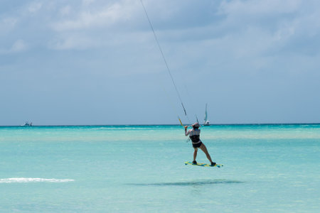Kitesurfing is common on the beaches of Aruba due to the winds that are available almost all year round on the island. Hadicurari beach. Aruba February 24, 2019.のeditorial素材