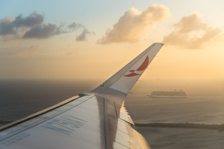 Avianca airline plane wing with a tourist cruise on the horizon in the background. Oranjestad. Aruba...