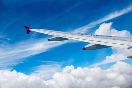 Avianca airline plane wings over blue sky. Avianca is one of the oldest air lines in the Americas....