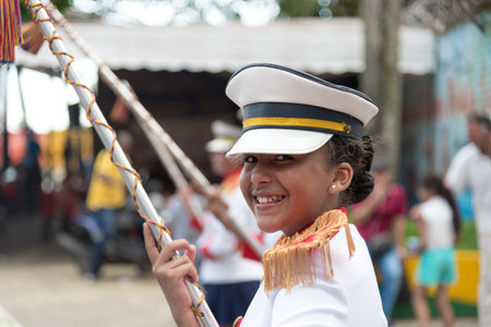 Close-up of girl with uniform in school music band parade in the city of Buenaventura. Cauca Valley....