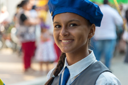 Happy teenager looking at camera during celebration in a country town of a memorable day in Colombia. San Alberto Cesar Colombia August 7, 2019.のeditorial素材