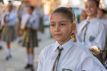 Young girl in a school parade on a memorial day in Colombia. San Alberto Cesar Colombia August 7, 2019.のeditorial素材