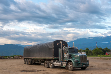 Classic truck parked on a dirt road with background clouds in a rural landscape. Santander Department. Colombia. August 5, 2019.のeditorial素材