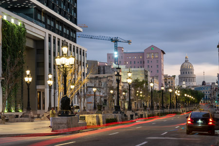 Paseo del Prado Avenue at sunset with lights from the street lamps on. Havana. Cuba. January 6, 2020のeditorial素材
