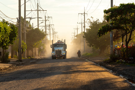 Truck transporting goods on a dirt road in a country town. Santander. Colombia. December 8, 2019.のeditorial素材
