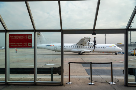 Propeller plane of the Colombian airline EasyFly that performs domestic flights parked at El Dorado airport. Bogota Colombia. November 15, 2019のeditorial素材