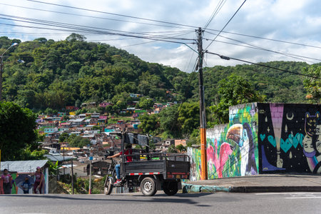 Three-wheeled motorcycle for the transport of merchandise and removals in a neighborhood of the city of Villavicencio. Colombia. Meta Department. December 4, 2020のeditorial素材
