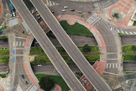 Aerial view of road intersection in the city. Top view.