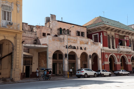 Deteriorated facades with columns ending in arches, this type of architecture very common in Old Havana. Havana Cuba. May 11, 2015.のeditorial素材