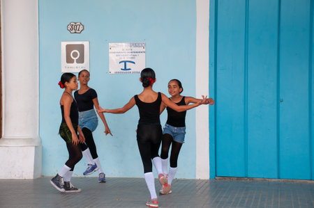 Girls practicing ballet in a doorway of a building in Old Havana. Havana. Cuba. May 12, 2015のeditorial素材