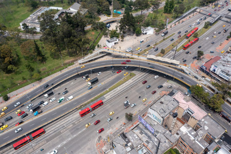 Aerial view of red public buses on 30th Avenue in the Colombian capital. BogotÃ¡. Colombia. February 23, 2022.のeditorial素材